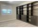 Bright office featuring built-in shelving and hardwood floors at 2110 Millergrove Ave, North Las Vegas, NV 89086