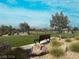 Pet park with a bench and landscaping at 2110 Millergrove Ave, North Las Vegas, NV 89086