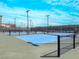 Three well-lit pickleball courts at 2110 Millergrove Ave, North Las Vegas, NV 89086