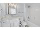 Clean bathroom with a bathtub and marble vanity at 2236 Waterton Rivers Dr, Henderson, NV 89044