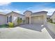 Front courtyard with tiled flooring, and attached garage at 2236 Waterton Rivers Dr, Henderson, NV 89044