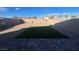 Artificial turf and a brick paved patio area at 2254 Cold Canyon Ave, North Las Vegas, NV 89086