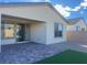 Covered patio, artificial turf, and a gravel backyard at 2254 Cold Canyon Ave, North Las Vegas, NV 89086