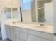 Double vanity bathroom with a walk-in shower at 2254 Cold Canyon Ave, North Las Vegas, NV 89086