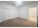 Spacious bedroom with carpet and access to a bathroom at 2254 Cold Canyon Ave, North Las Vegas, NV 89086