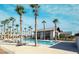 Resort-style pool with palm trees and lounge chairs at 2254 Cold Canyon Ave, North Las Vegas, NV 89086