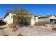 Single-story house with brown garage door and landscaped front yard at 2254 Cold Canyon Ave, North Las Vegas, NV 89086