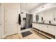 Modern bathroom with double vanity, marble shower, and stylish fixtures at 2401 Weaverville Dr, Henderson, NV 89044