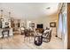 Light and airy living room with wicker furniture at 2401 Weaverville Dr, Henderson, NV 89044