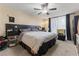 Spacious bedroom with a large bed and access to a private bathroom at 2477 Vallarta Cir, Las Vegas, NV 89121