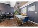 Stylish dining area with a white table and modern chairs at 2477 Vallarta Cir, Las Vegas, NV 89121