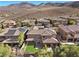 Birds-eye view of a home with manicured backyard and mountain views at 2717 Mona Lisa St, Henderson, NV 89044