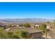 Community view with mountain backdrop and Spanish-style homes at 2717 Mona Lisa St, Henderson, NV 89044