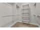 Walk-in closet with shelving and ample space for storage at 2717 Mona Lisa St, Henderson, NV 89044