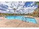 Refreshing community pool with cabanas and lounge chairs at 2717 Mona Lisa St, Henderson, NV 89044