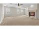 Expansive bedroom with fireplace, neutral colors and plantation shutters allowing natural light at 2717 Mona Lisa St, Henderson, NV 89044