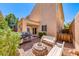 Landscaped backyard with fire pit, grill, and seating area at 2744 Drummossie, Las Vegas, NV 89044