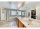 Bathroom with double sinks, a large soaking tub, and a walk-in shower at 2744 Drummossie, Las Vegas, NV 89044