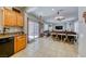 Open concept kitchen with granite counters, wood cabinets & view to Gathering room at 2744 Drummossie, Las Vegas, NV 89044