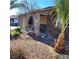 Stone exterior with arched entryway and palm trees at 3011 Liberty Cir, Las Vegas, NV 89121