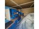 Garage with blue cabinets and additional storage at 3011 Liberty Cir, Las Vegas, NV 89121