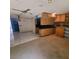 Kitchen area with wooden cabinets and tiled floor at 3011 Liberty Cir, Las Vegas, NV 89121