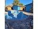 Large pool needing some TLC, with adjacent shed at 3011 Liberty Cir, Las Vegas, NV 89121