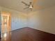 Spacious bedroom with hardwood floors and double door closet at 3012 Morning Ridge Dr, Las Vegas, NV 89134