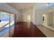 Bright dining room with hardwood floors and sliding glass doors at 3012 Morning Ridge Dr, Las Vegas, NV 89134