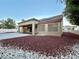 House exterior featuring a covered patio and solar panels at 3012 Morning Ridge Dr, Las Vegas, NV 89134