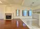 Living room with fireplace, hardwood floors and built-in shelves at 3012 Morning Ridge Dr, Las Vegas, NV 89134