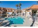 Inviting community pool surrounded by luxury homes, featuring clear blue water and a relaxing atmosphere for residents at 3173 Lido Isle Ct, Las Vegas, NV 89117