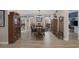 Inviting dining room with hardwood floors, ample natural light, a rustic dining table, and classic furnishings at 3173 Lido Isle Ct, Las Vegas, NV 89117