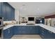 Beautiful kitchen with stone countertops, stainless steel appliances, and custom cabinets at 3173 Lido Isle Ct, Las Vegas, NV 89117