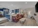 Open concept kitchen with island and blue cabinetry at 3173 Lido Isle Ct, Las Vegas, NV 89117