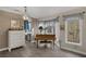 Living area with grand piano and bay window at 3173 Lido Isle Ct, Las Vegas, NV 89117