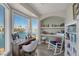 Bright office featuring water view, desk, and white rocking chair at 3173 Lido Isle Ct, Las Vegas, NV 89117