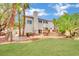 Spacious backyard with patio and stunning landscaping at 3380 Shallow Pond Dr, Las Vegas, NV 89117