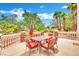 Outdoor patio with table and chairs, perfect for dining al fresco at 3380 Shallow Pond Dr, Las Vegas, NV 89117