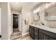 Elegant bathroom with double vanity and walk-in shower at 3615 Bitonto Ln, Henderson, NV 89044