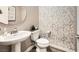 Stylish powder room with geometric tile and modern vanity at 3615 Bitonto Ln, Henderson, NV 89044