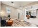 Lofted hallway with seating area and access to bedroom at 3615 Bitonto Ln, Henderson, NV 89044