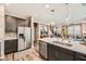 Modern kitchen with stainless steel appliances and island at 3615 Bitonto Ln, Henderson, NV 89044