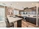 Modern kitchen with stainless steel appliances and an island at 3615 Bitonto Ln, Henderson, NV 89044