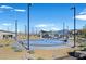 Community playground with play equipment and shaded seating at 3615 Bitonto Ln, Henderson, NV 89044