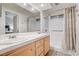 Bathroom with double vanity, shower, and linen closet at 3790 Morning Canyon St, Las Vegas, NV 89147