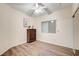 Well-lit bedroom with wood dresser and flooring at 3790 Morning Canyon St, Las Vegas, NV 89147