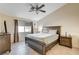 Spacious bedroom with a king-size bed and ensuite bathroom access at 3790 Morning Canyon St, Las Vegas, NV 89147