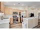 Bright kitchen with island and stainless steel appliances at 3790 Morning Canyon St, Las Vegas, NV 89147