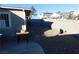 Backyard with gravel and a block wall at 3886 Via Lucia Dr, Las Vegas, NV 89115